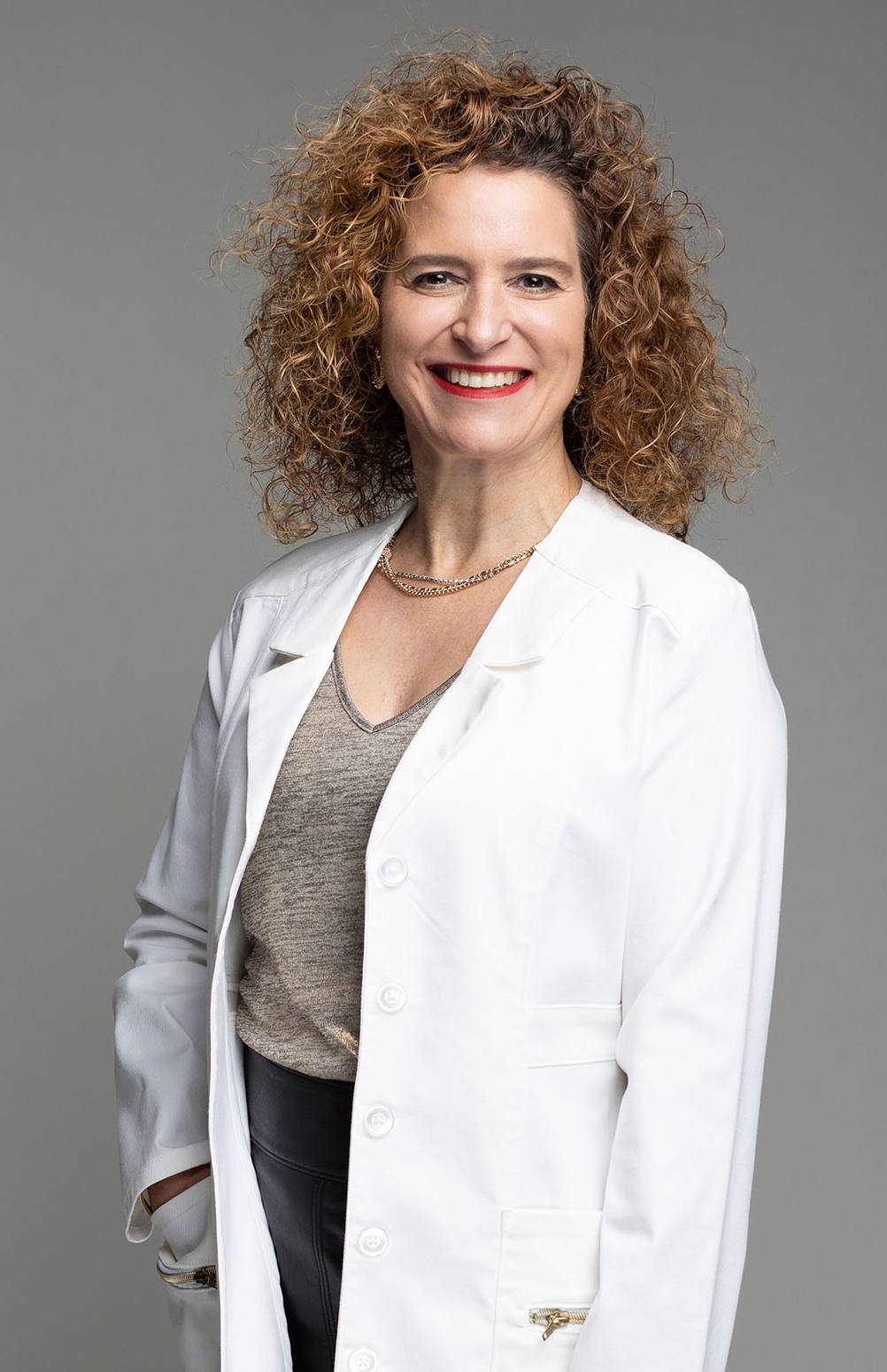 Dr Tianna Tsitsis in white lab coat