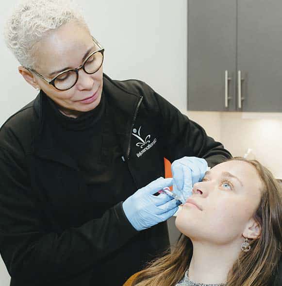 Lip filler with Registered Nurse, Deb, at RejuvenationMD