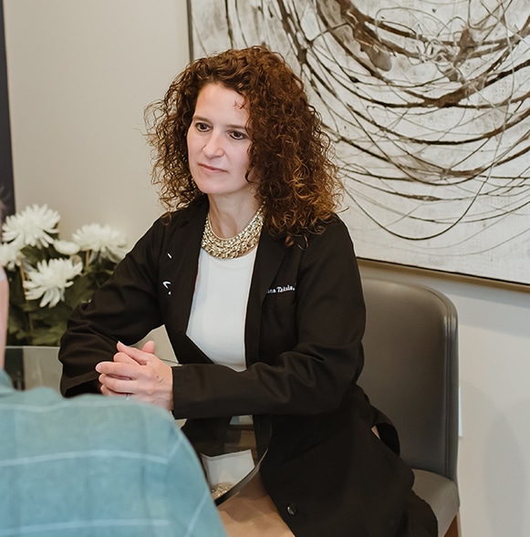 Physician listening to patient's concerns about his sexual wellbeing.