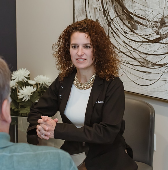 Physician consulting with patient about the P-Shot for men's health.