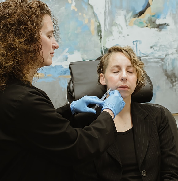 VFL-1 Physician injects PRP into the nasolabial folds of a patient.