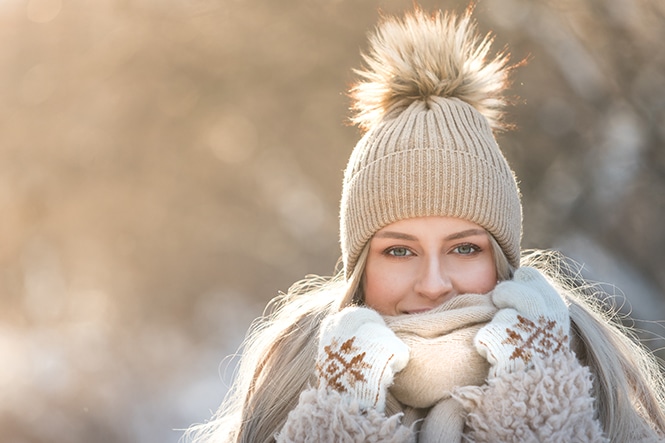 Bellingham woman cradles face in the winter weather