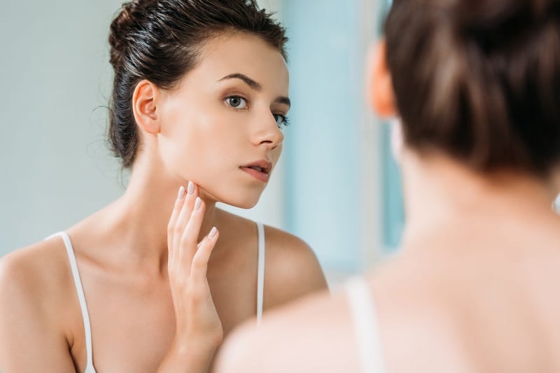 Woman after treatments for stressed skin